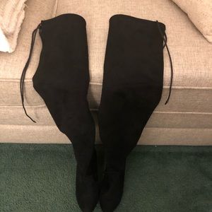 Over the knee high heeled boots